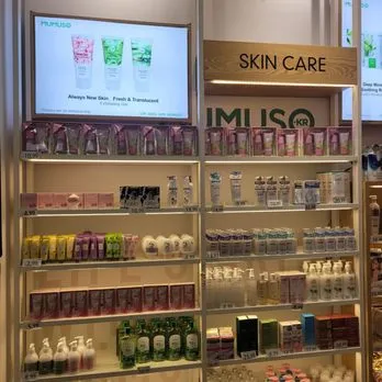 MUMUSO skincare shelves and product display