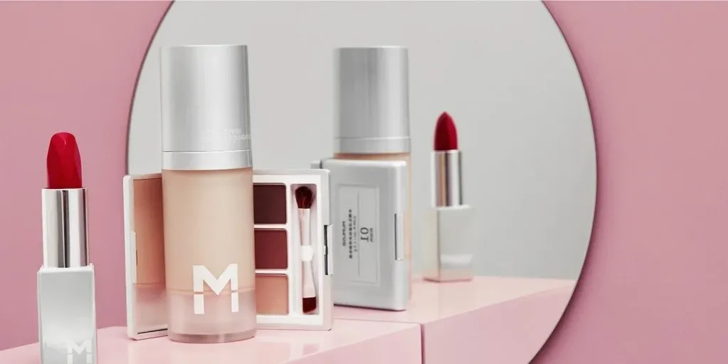 MUMUSO makeup collection on a pink backdrop