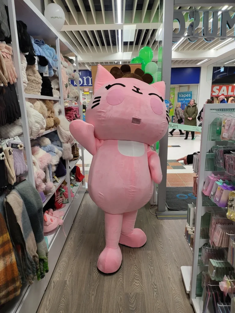MUMUSO character greeting visitors inside the Summerside store